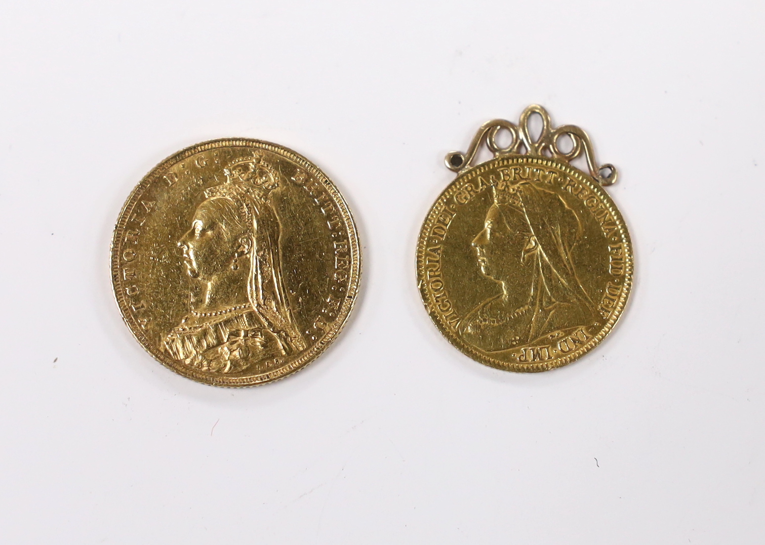 An 1890 gold sovereign and 1901 half sovereign in pendant mount.
